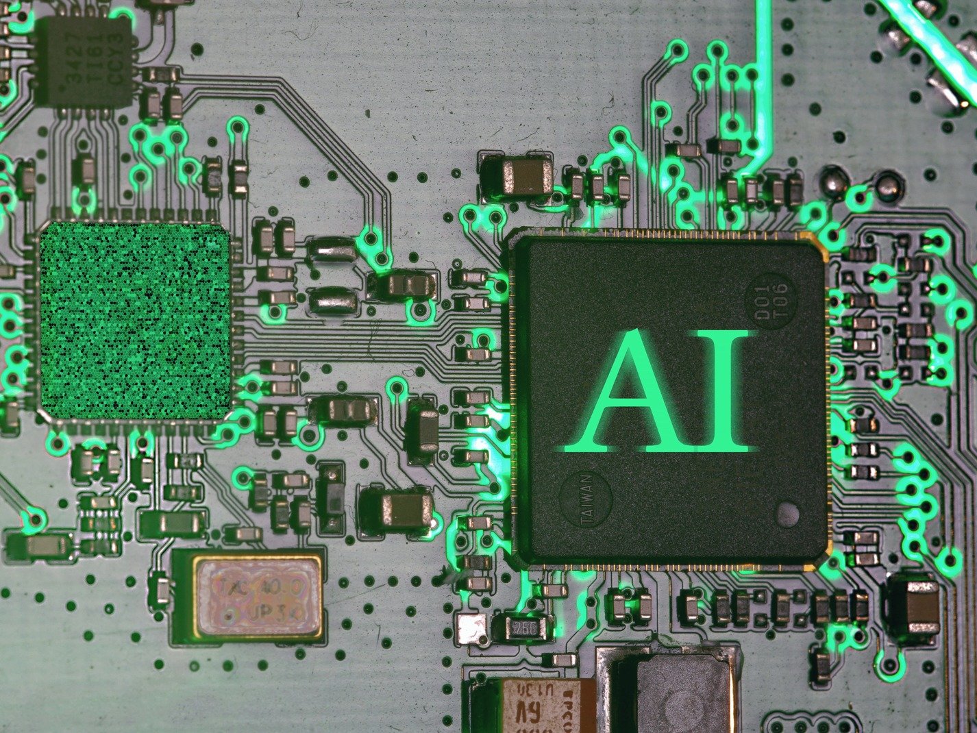 A circuit board with a glowing green AI processor chip