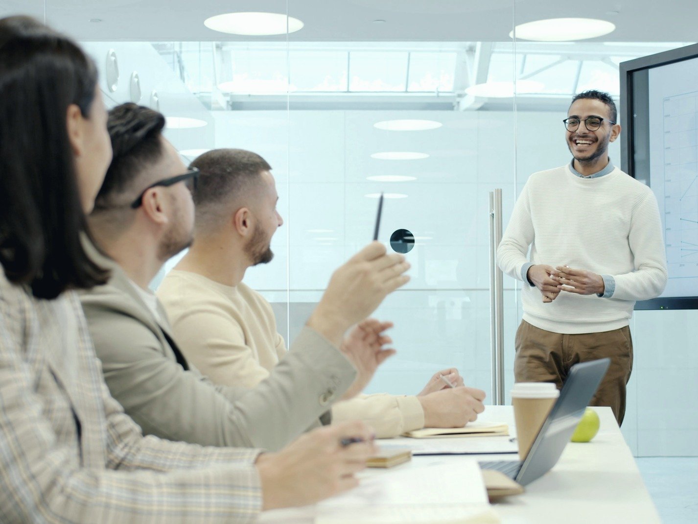 A team in a bright meeting room during a business presentation